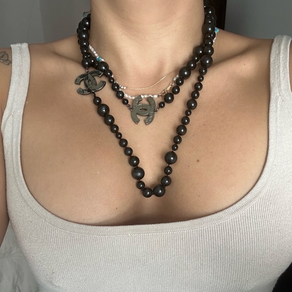 Channel long black necklace